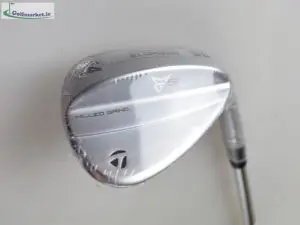 Having spent countless hours with the best players in the world, the TaylorMade R&D team has learned that a wedge can never feel soft enough in their hands. That’s why for the first time ever, MG5 wedges are fully forged from soft carbon steel. Not only does the forging process allow golfers to experience soft feel around the green where they need it most, it ensures consistency in the wedge from top to bottom. The process starts with a billet of soft carbon steel that’s heated and bent into an L-shape. The piece then goes through a rough forging process where excess material is trimmed away, and the wedge begins to take shape. Next comes precision forging where the cosmetics and the grind begin to form. From there, the grind, face, grooves and hosel are machined to ensure consistency and that each wedge comes out exactly as it was designed. The final steps involve a slew of cosmetic detailing processes to round out the final product. Compared to MG4, MG5 features refined leading-edge curvature and an updated top line blend for a more symmetric overall profile. SAW-MILLED GROOVES MG5 wedges are the first in the MG family to employ aggressive saw-milled grooves. The saw-milling process allows TaylorMade’s designers to come even closer to the legal limits of groove geometry. Reengineered with ultra-tight tolerances, steeper walls and sharper radii, these grooves help MG5 produce more spin than previous MG generations. SPIN RETENTION IN WET CONDITIONS Like MG generations before, MG5 wedges utilize a RAW face finish and all-new continuous Spin Tread Technology to help golfers maintain spin and control in wet conditions. The continuous Spin Treads act like all-weather tires on a road as they redirect water away from the face and increase friction at impact. With Spin Tread Technology working in concert with the saw-milled grooves, MG5 retains 13% more spin than MG4 in wet conditions. These technologies also maintain a more consistent launch angle between wet and dry conditions. MORE GRIND OPTIONS FOR MORE GOLFERS MG5 wedges feature six different Tour-inspired grinds that were crafted by TaylorMade master wedge craftsman Greg Cesario to give golfers a wide array of options to fit their game. Three of those grinds fit TaylorMade’s standard bounce profile that the majority of golfers gravitate toward: the SB, SC and SX grinds. SB GRIND The SB grind features a full sole design with constant trailing edge relief for smooth and consistent turf interaction that’s compatible with most swing types. This grind’s gentle four-way camber allows for increased versatility for golfers that like to manipulate the face. Additionally, the increased sole width provides an added layer of forgiveness, especially for golfers with steeper swings. Most golfers will find this wedge beneficial in virtually all turf conditions. SC GRIND The SC grind is TaylorMade’s signature mid-bounce grind and has quickly become the preferred grind amongst staff club professionals. The medium-low bounce design with added camber in the middle of the sole also features distinct heel, toe and trailing edge relief. The result is a grind that’s crafted for ultimate greenside versatility in all turf conditions for players that like to manipulate the face, while providing consistent full-shot stability at the same time. SX GRIND A new grind in the MG family, the SX grind features the widest sole and utilises increased curvature to provide consistent turf interaction and performance out of the bunker. The reverse-C trailing edge provides relief which keeps the bounce consistent as golfers manipulate the face. This grind is ideal for golfers looking for the ultimate blend of stability and versatility. In addition to the three standard bounce options, the MG5 line also includes three additional grinds for golfers looking for specialised performance. HB GRIND The HB grind is crafted for golfers with steeper swings or that play in soft conditions. Its high-bounce design provides stability and forgiveness. At the same time, unique heel relief and the tapered trail edge allow for plenty of versatility, and for the wedge to exit the turf quickly without digging. LB GRIND The LB grind features minimal bounce and allows the leading edge to sit close to the ground. The modified C-grind emphasises this address orientation, especially when the face is in an open position. The pronounced beveled leading edge and added camber prevent the leading edge from digging. This grind is perfect for golfers with shallow swings and those that play in tigh